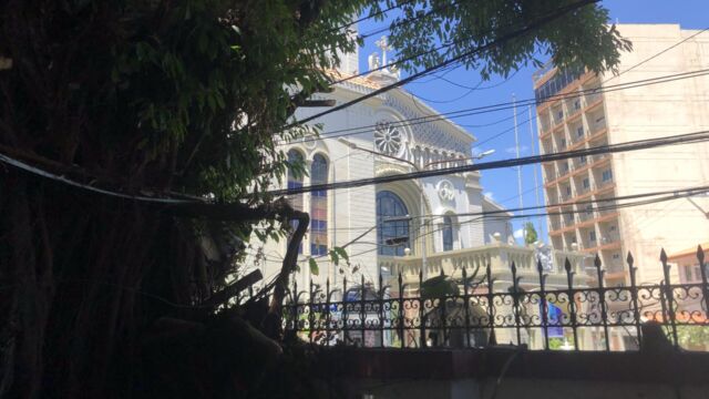 Looking over a wall at a cathedral